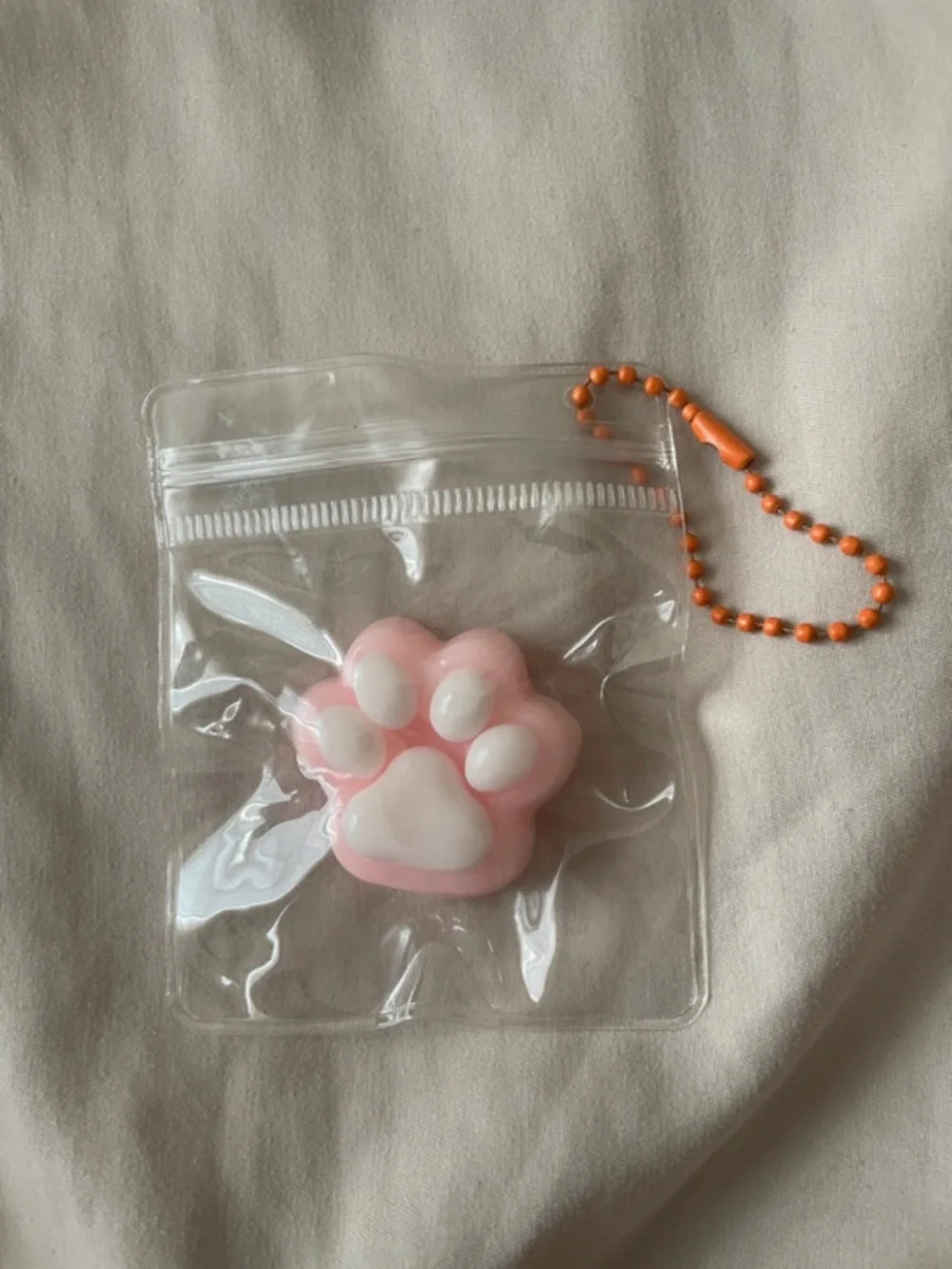 Pink cat paw squishy